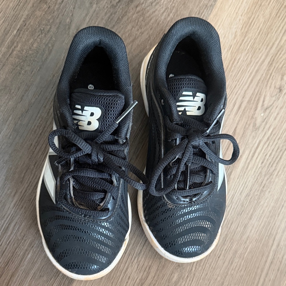New Balance Kids Black and White baseball cleats
